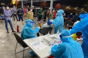 Cả nhà người bán thịt heo chợ Bình Điền test nhanh dương tính 