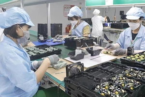 Kinh tế Việt Nam tăng tốc nhưng chịu không ít áp lực 