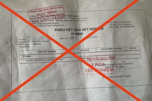 Hai anh em ở Bình Dương làm giấy test nhanh COVID-19 giả để ‘thông’ chốt