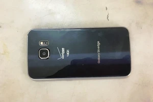 Lẻn vào đám tang trộm điện thoại