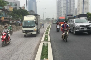 Hoàn thiện nâng cấp đường Võ Văn Kiệt đón Tết Tây