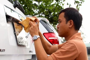 CSGT TP.HCM nói gì về việc bỏ hộ khẩu khi đăng ký xe?