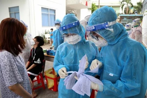 Lực lượng y tế tham gia chống dịch tại TP.HCM. Ảnh: HOÀNG GIANG