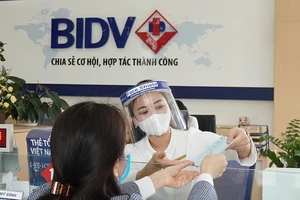 Giảm lãi suất cho vay, hỗ trợ doanh nghiệp vượt khó