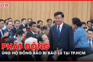 Tổng Bí thư, Chủ tịch nước Lào tham dự lễ phát động ủng hộ đồng bào bị bão lũ tại TP.HCM