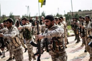 Hàng chục xe vũ khí của Mỹ tiến vào Syria