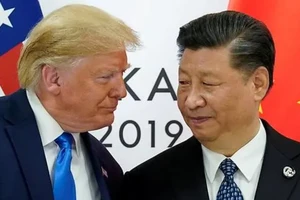 Tổng thống Mỹ Donald Trump (trái) và Chủ tịch Trung Quốc Tập Cận Bình. Ảnh: REUTERS