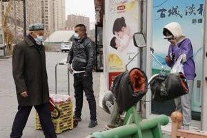 Trung Quốc trả đũa trừng phạt Mỹ, Canada liên quan Tân Cương