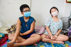 Câu chuyện của những đứa trẻ có mẹ làm tài xế Grab