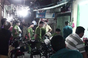 Con giết mẹ, chém anh trai ở chợ Nhật Tảo