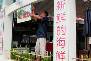 Vụ “phố” Trung Quốc ở Đà Nẵng: Tháo dỡ các biển hiệu sai quy định 