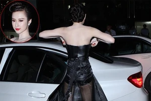 Sao Việt vô tư chỉnh váy áo 