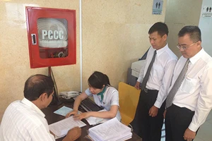 Bưu điện TP.HCM triển khai dịch vụ thu BHYT hộ gia đình