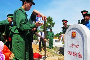 Lễ truy điệu, an táng 15 hài cốt liệt sĩ Việt Nam hi sinh tại Lào