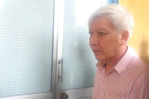 Tạt axit hàng xóm vì nghi ngoại tình với vợ