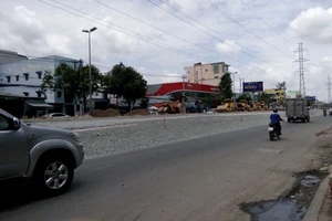 Vụ đường TP.HCM nâng 2 m, phải tìm cách giảm thiệt hại