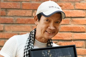 Nhiếp ảnh gia Trần Thế Phong: 'Tôi đã trả được nợ với nghề'