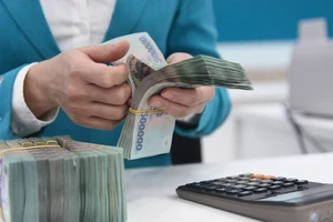 Lý do chưa thể bỏ ngay trần tín dụng