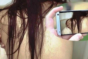 Tung clip nóng dọa bạn tình, bị dính tội làm nhục người khác