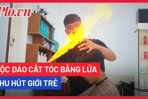 Video: Độc đáo cắt tóc bằng lửa thu hút giới trẻ tại TP.HCM