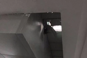 Cháu bé rơi từ độ cao 3 m xuống hầm để xe