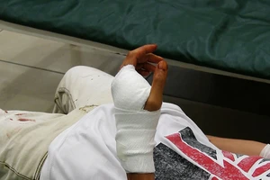 Tài xế Grabbike bị chém nhập viện trước Bến xe Miền Tây