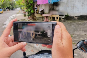 Quảng cáo web cờ bạc trên ghế đá chung cư Tây Thạnh và nhiều tuyến đường tại Tân Phú