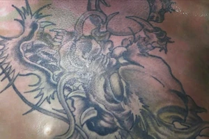 Công an điều tra nguyên nhân tử vong của người có hình xăm đầu rồng