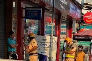 Công an TP.HCM thông tin về clip CSGT khống chế tài xế taxi giật biên bản