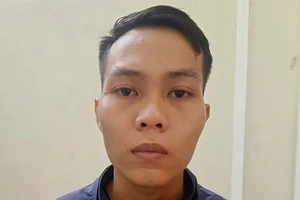 Hoàng Xuân Dũng tại cơ quan công an. Ảnh: CA