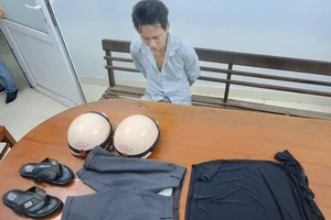 Đối tượng Lê Hồng Hải tại cơ quan công an. Ảnh: DH.