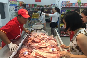 CPI tháng 11 tăng cao nhất 9 năm vì giá thịt heo leo thang 