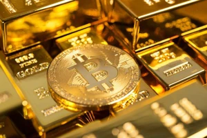 Giá vàng sẽ khó ngóc đầu vì lép vế trước tiền ảo bitcoin?