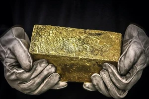 Lo trùm bất động sản Trung Quốc vỡ nợ, nhà đầu tư mua vàng 