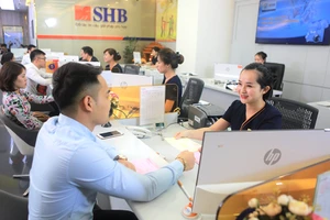 Theo Phó Thống đốc NHNN Đào Minh Tú: “Trong trường hợp cần thiết, trước khi hết hiệu lực khoảng ba tháng, NHNN có thể tiếp tục duy trì Thông tư 02 để gỡ khó cho nền kinh tế”. Ảnh: THÙY LINH