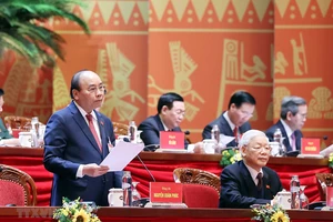 Ủy viên Bộ Chính trị, Thủ tướng Chính phủ Nguyễn Xuân Phúc thay mặt Đoàn Chủ tịch điều hành Đại hội. Ảnh: TTXVN