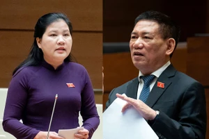 Đại biểu Đinh Thị Phương Lan (đoàn Quảng Ngãi) và Phó Thủ tướng, Bộ trưởng Bộ Tài chính Hồ Đức Phớc tại phiên thảo luận sáng 7-11.