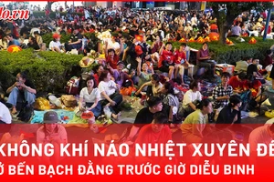 Trung tâm TP.HCM náo nhiệt đêm 29-4, người dân giữ chỗ chờ xem diễu binh