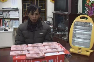 Phá đường dây tiền giả từ Trung Quốc về VN tiêu thụ