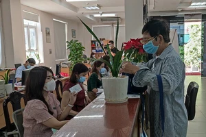 Từ ngày 1-4, thủ tục cấp thẻ BHYT theo mẫu mới ra sao?