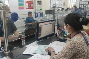 Nếu việc đăng ký kết hôn trước ngày 1 -1-2016 nhưng sổ hộ tịch và bản chính giấy tờ hộ tịch đều bị mất thì được đăng ký lại. Ảnh : Nguyễn Hiền 