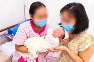 Một trường hợp mang thai hộ vì mục đích nhân đạo sinh con tại Bệnh viện Hùng Vương, TP.HCM. Ảnh: BVCC