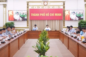 Hội nghị sơ kết công tác Tư pháp 6 tháng đầu năm và triển khai công tác 6 tháng cuối năm tại điểm cầu TP.HCM. Ảnh: VĂN THUẬN