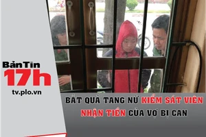 Bắt quả tang nữ kiểm sát viên nhận tiền của vợ bị can