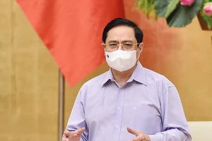 Thủ tướng: Tiếp cận mọi khả năng để có vaccine COVID-19