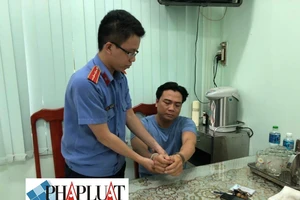 Đại úy công an cho bị can thuê điện thoại bị truy tố