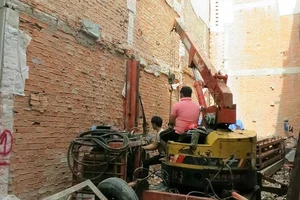 Nhà kế bên xây dựng gây thiệt hại cần làm gì?