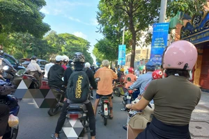 Đi xe đạp điện không đội nón bảo hiểm có bị phạt không?