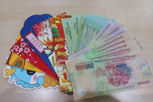 Tôi giữ hết tiền lì xì của con!