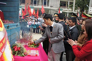 Đưa 31 hài cốt liệt sĩ Việt Nam hy sinh ở Lào về nước